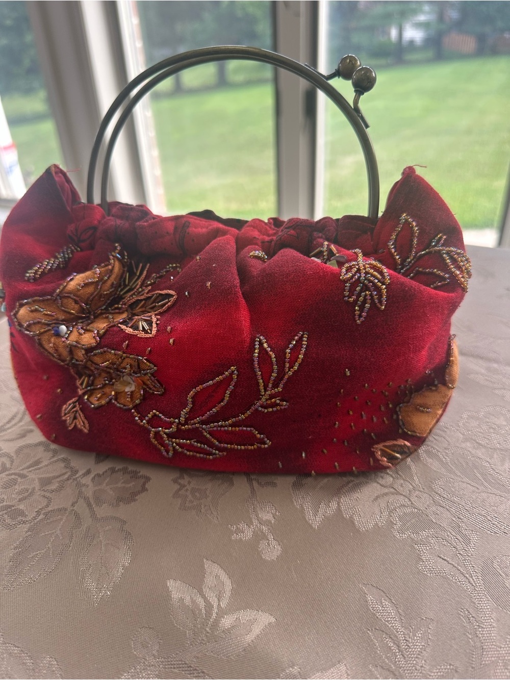 Red Embroidered Handbag with Metal Handles